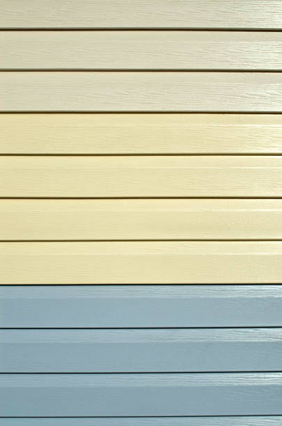 istock New light different  color vinyl siding on wall in shop closeup 2243745180