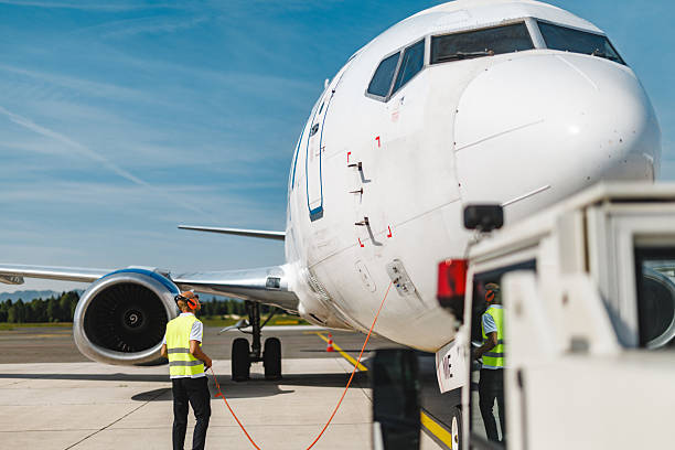 istock Concentrated Hispanic Technician Engaging in Detailed Aircraft Systems Check on Sunny Airport Tarmac 2243745284
