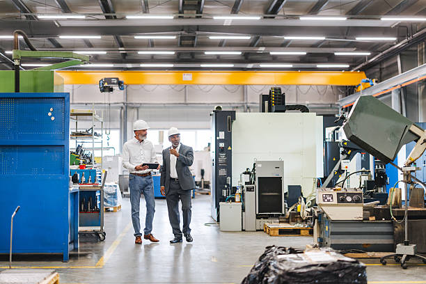 istock Industrial Scene with Hispanic Manager and Caucasian Engineer Discussing Workflow Enhancements 2243745548