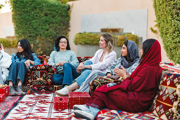 istock Middle Eastern Women Socializing in Traditional Outdoor Setting with Arabic Decor 2243747209