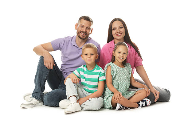 istock Lovely family posing together on white background 2243748094