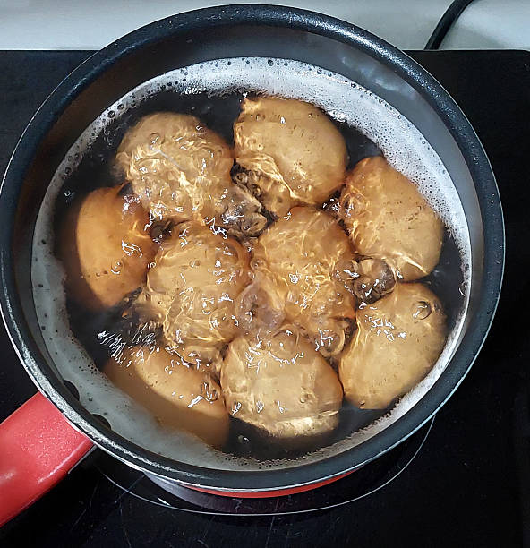 istock Boiling Eggs in Pot on Electric Stove 2243748261