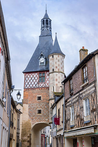 istock Saint Fargeau's medieval gate and clock tower at Place Republique 2243750659