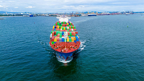 istock Large container cargo ship sailing in ocean with colorful freight boxes. Ideal for global logistics, maritime shipping, international trade, export-import business, and transportation concepts. 2243753707