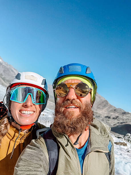 istock Couple Taking Selfie on Glacier Climbing Adventure 2243753756