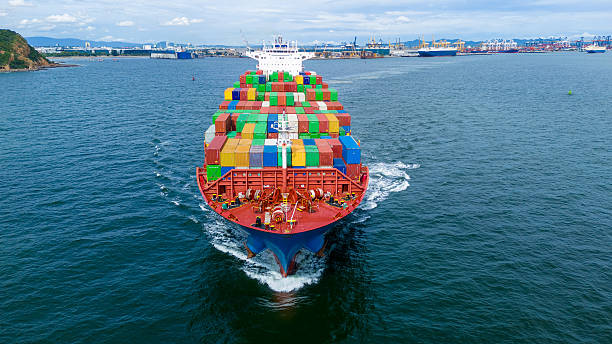istock Large container cargo ship sailing in ocean with colorful freight boxes. Ideal for global logistics, maritime shipping, international trade, export-import business, and transportation concepts. 2243753796