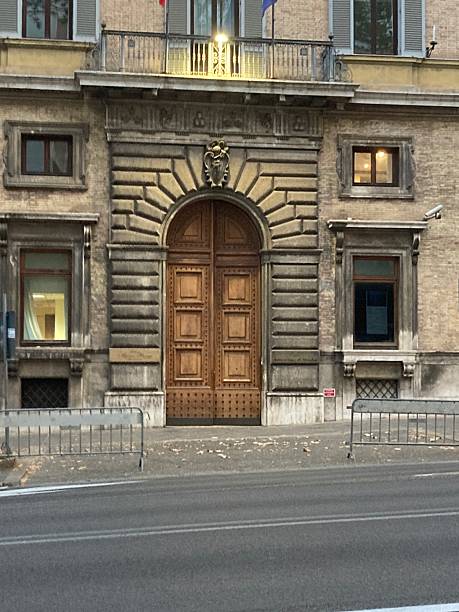 istock Rusticated Archway Wooden Door 2243757748