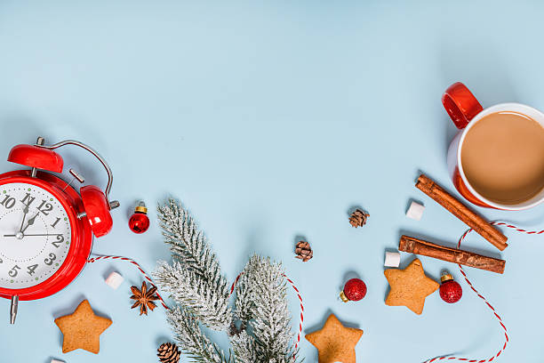 istock Christmas and New Year holiday composition. Flat lay with blank copy space. An alarm clock with decorations on an isolated background. Top view festive concept. 2243758766
