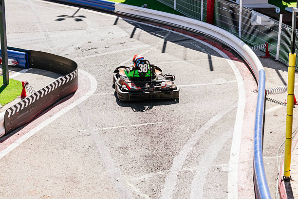 istock Go-kart racing on a track during competitive sport activity 2243761903