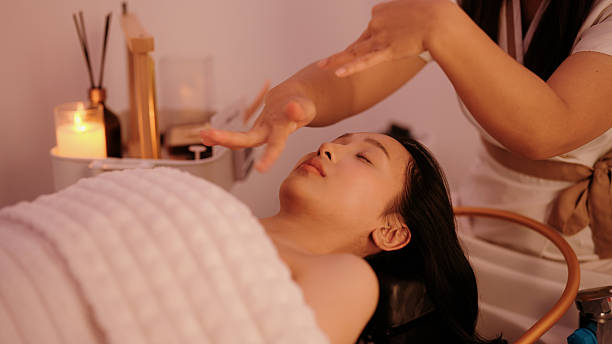 istock Female client receiving aromatherapy using soothing scents from a spa therapist at the spa wellness center 2243762408