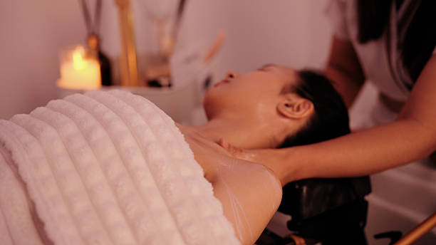 istock Asian female client receiving a relaxing shoulder massage from a spa therapist 2243762475