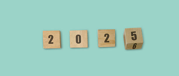 istock Wooden cubes changing year 2025 to 2026 on neutral background 2243763304