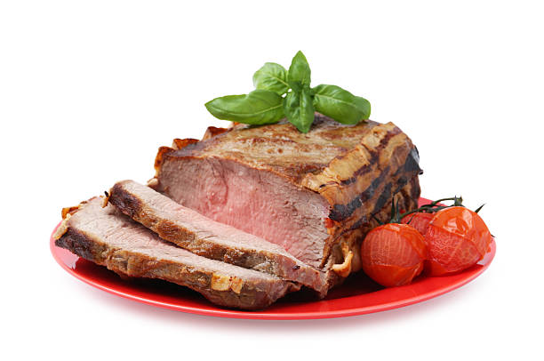 istock Delicious baked beef meat, tomatoes and basil isolated on white 2243763606