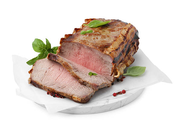 istock Delicious baked beef meat and spices isolated on white 2243763609