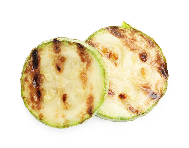 istock Delicious grilled courgette slices isolated on white, top view 2243763930