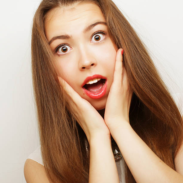 istock Beautiful young surprised woman. 2243772016