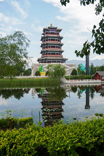 istock Traditional multi - storied pagoda by the lake with clear reflection 2243775753