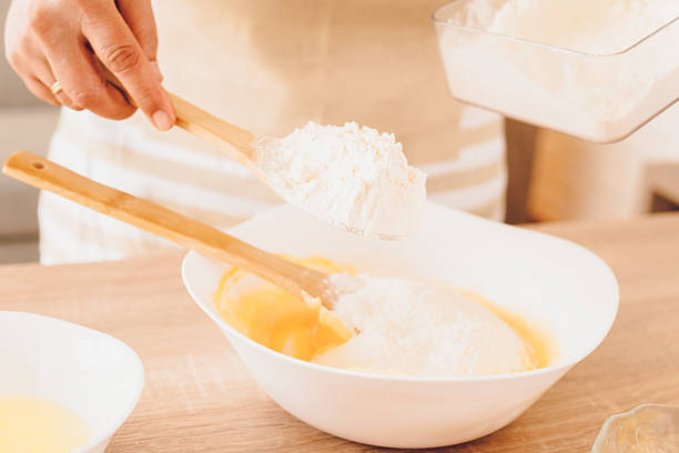 istock A woman whips cream for cakes 2243780774