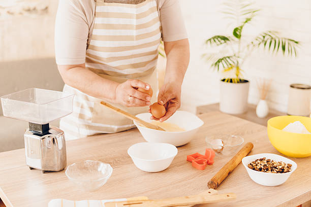 istock A woman whips cream for cakes 2243781409