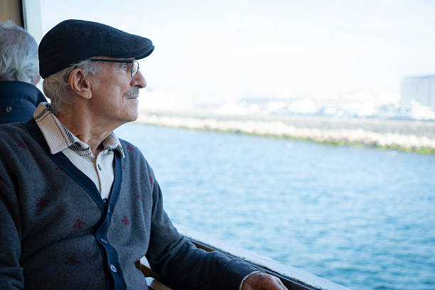 Senior man traveling on a ferry boat