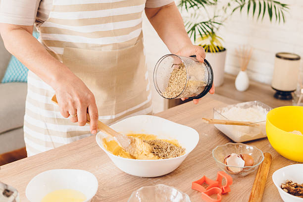 istock A woman whips cream for cakes 2243781961