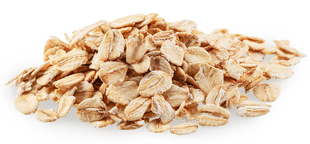 istock Rolled oat flakes isolated on white background. Macro shoot. File contains clopping paths. 2243782188