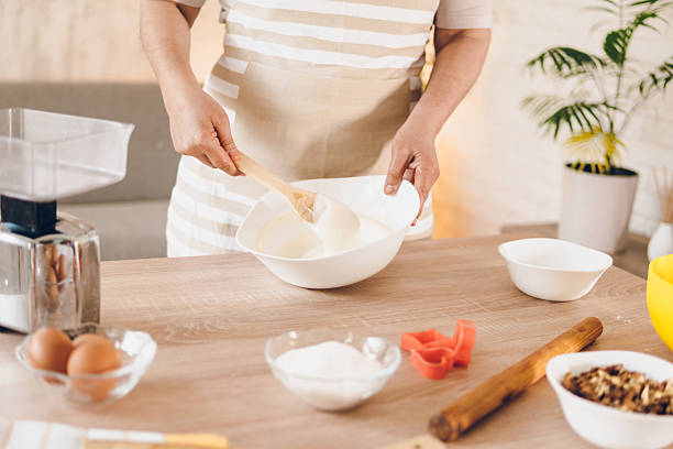 istock A woman whips cream for cakes 2243782754