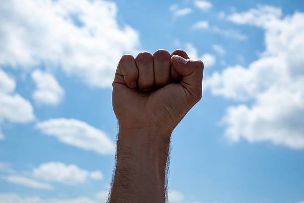 istock Clenched fist Labor day 2243783570