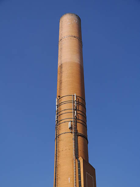 istock Tall brick tower with a blue sky in the background 2243784252