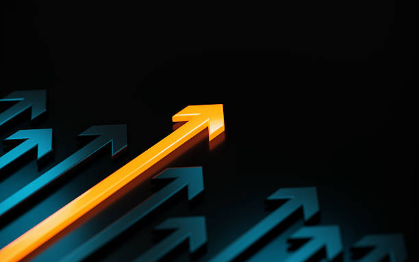 istock Arrow Symbols On Dark Background - Standing Out From The Crowd Concept 2243788699