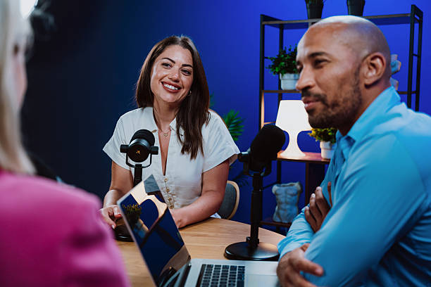 istock Group of three hosts is capturing a live audio broadcast 2243791767