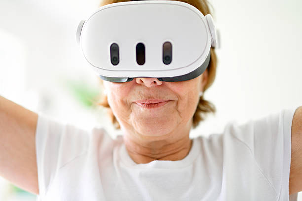 istock nice senior woman play virtual reality game 2243794592