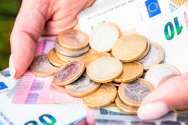 istock Euro cash in coins and banknotes 2243796785