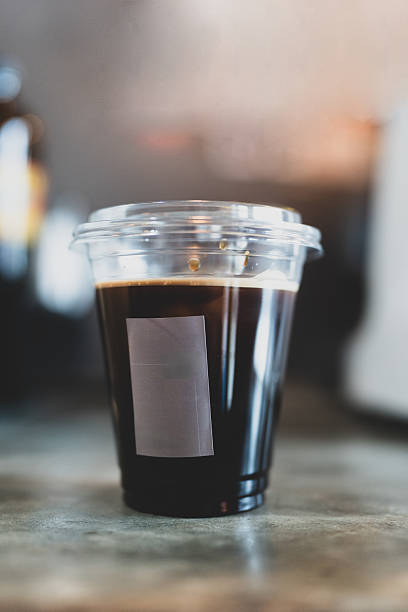 Close up of a plastic cup iced americano