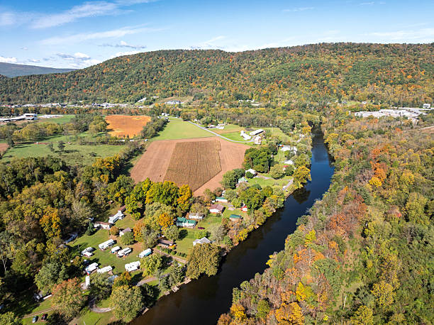 istock River flowing through forested valley near Bedford, Pennsylvania 2243797109