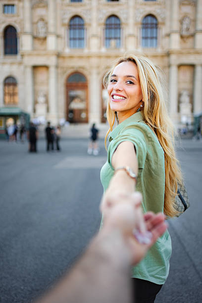 istock Woman leading partner while traveling in Vienna Austria 2243797594