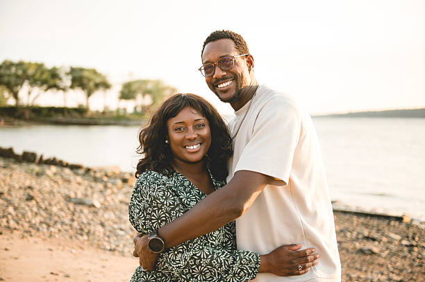 istock Couple on beach with love, bonding and sunset for holiday 2243798268