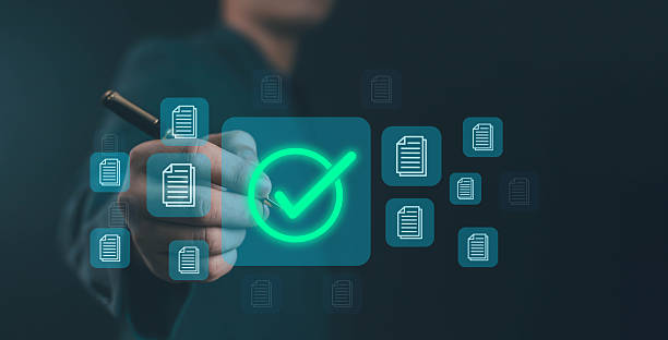 istock Digital document approval concept with businessman selecting green check mark icon on virtual interface, representing successful verification, quality assurance, and online data management. 2243798275