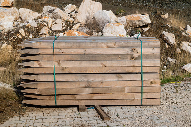 A pallet of planks awaits delivery.