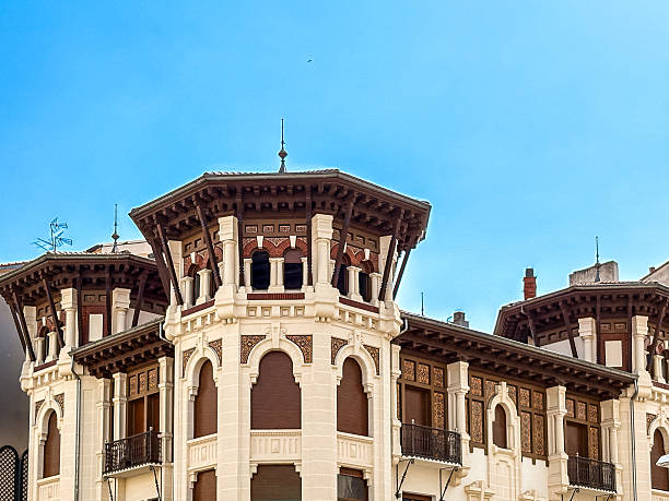istock Sunlit urban scene in Pamplona with mixed architecture 2243802701
