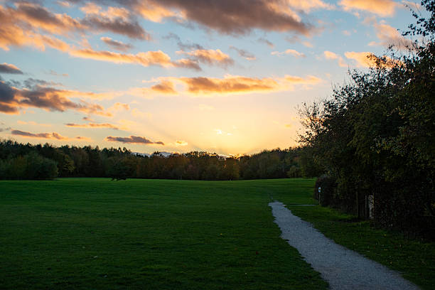 istock Landscape with a beautiful sunset and trees in autumn color. 2243803121