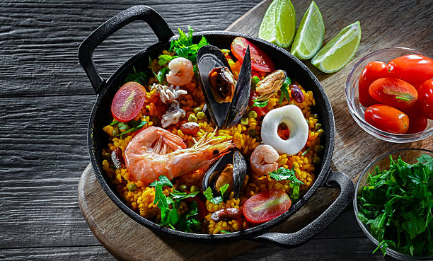 istock Seafood paella served in a cast iron pan 2243806850