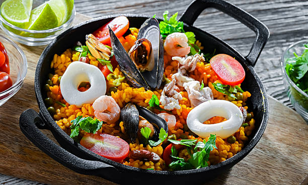 istock Seafood paella served in a cast iron pan 2243806880
