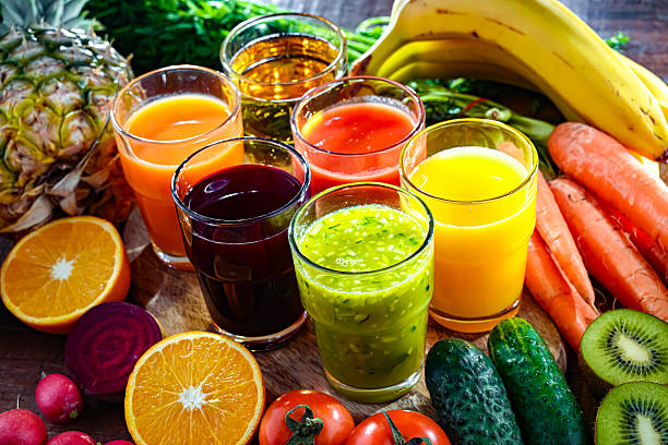 istock Glasses with fresh organic vegetable and fruit juices 2243806891