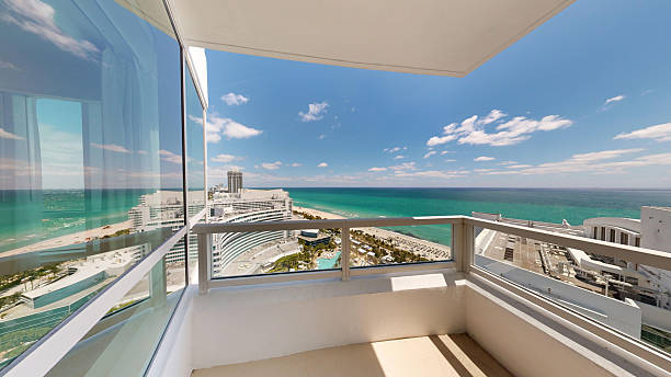 Luxury waterfront house. Hotel building architecture at bridge. Residential architecture building. Residential apartment in waterfront city. City waterfront with house. Vacation building in summer.