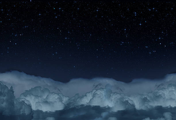 istock Night Starry Sky against a Background of Clouds 2243808764