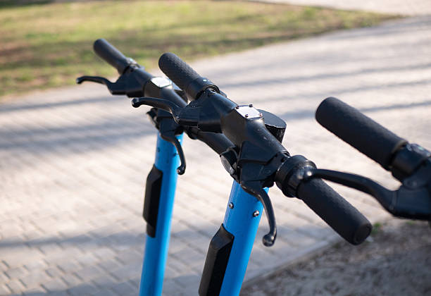 istock Close up of electric scooter handlebars in park 2243809007