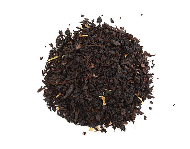 istock Pile of black tea isolated on white. 2243812435
