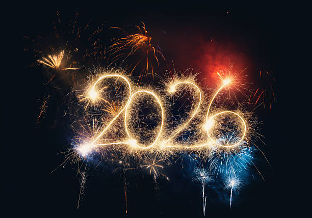 istock Sparkler Happy New Year 2026 with fireworks 2243814543