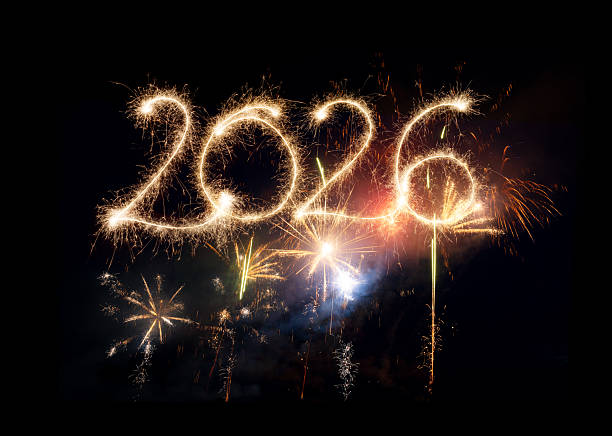istock Sparkler Happy New Year 2026 with fireworks 2243814565